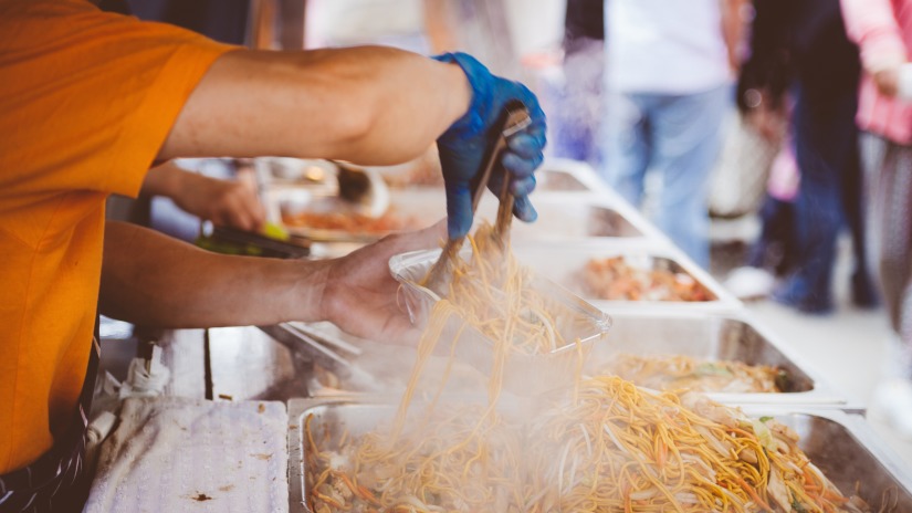 food being served from a hot plate