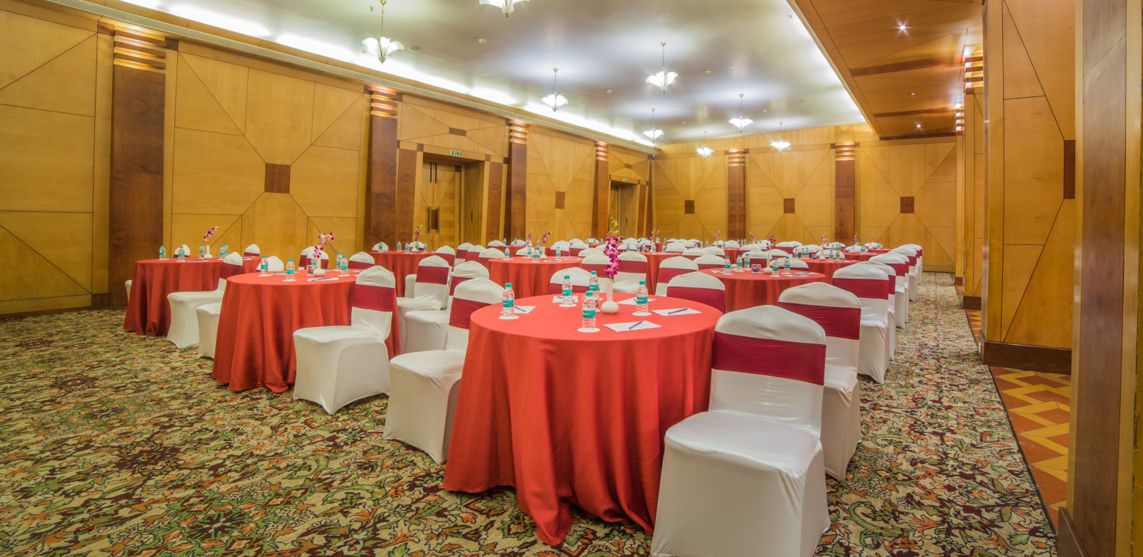 Seating arrangement in Mayfair Hall at Sitara Luxury Hotel