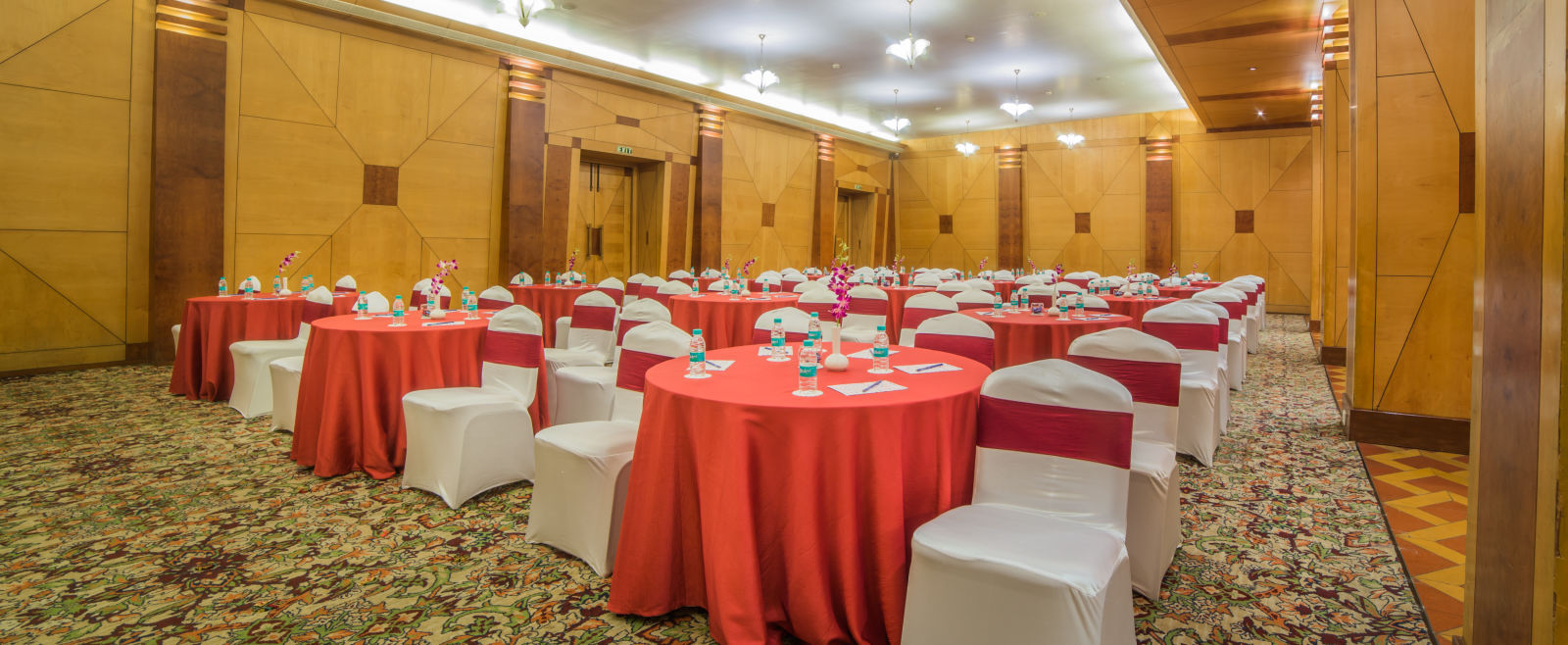 Seating arrangement in Mayfair Hall at Sitara Luxury Hotel