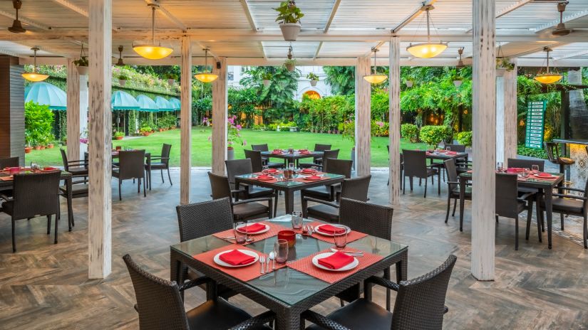 interior view of Aromas Coffee Shop during daytime - Coffee Shop in Kolkata - Kenilworth Hotel