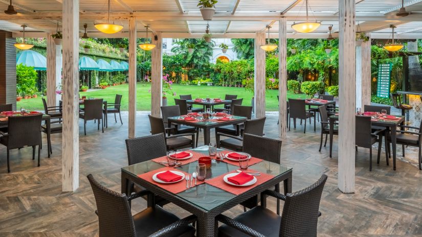 interior view of Aromas Coffee Shop during daytime - Coffee Shop in Kolkata - Kenilworth Hotel