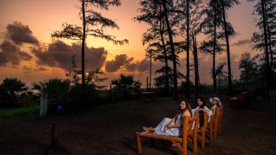 Lotus Eco beach resort, wooden seats outside