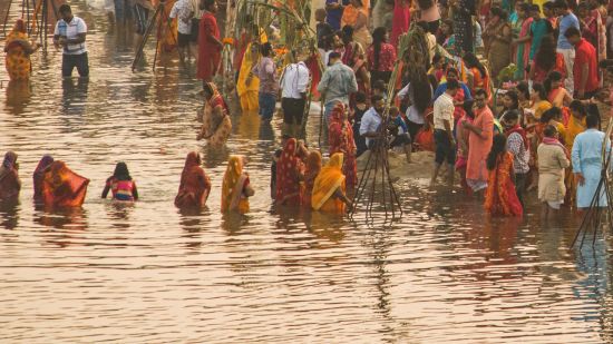 people dipping in ghat