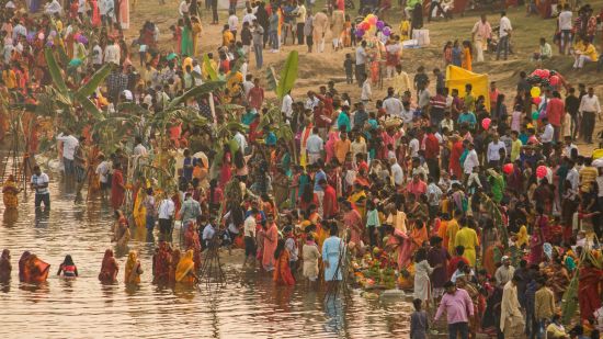 people dipping in ghat