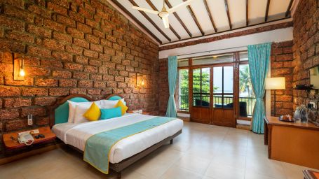 Lotus eco beach resort, Stay in Dapoli with a king size bed, study table on the side at Sea Breeze Suite