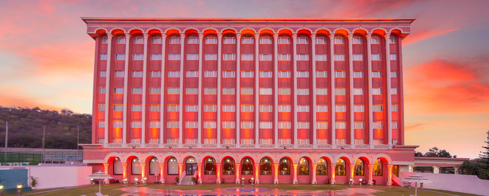 Facade of Sitara Luxury Hotel during the evening