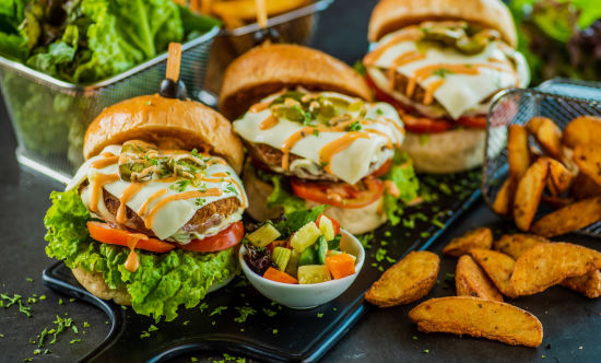 alt-text three mini burgers with potato wedges - polo floatel kolkata