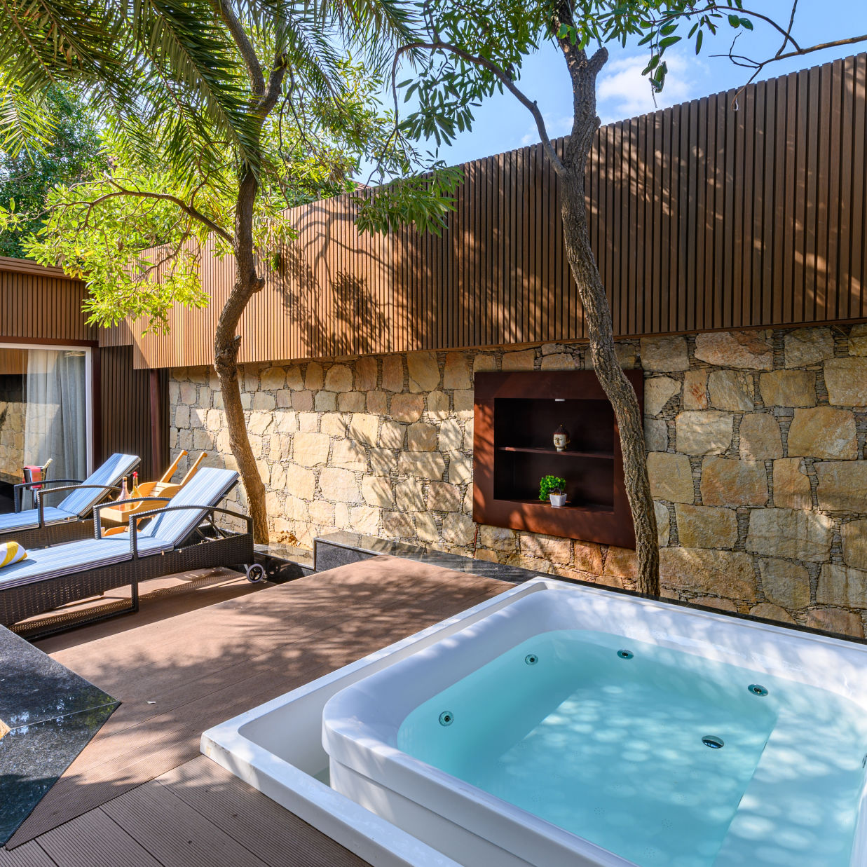 the sit out area of our presidential suite with a jacuzzi for a delightful stay in Pushkar7