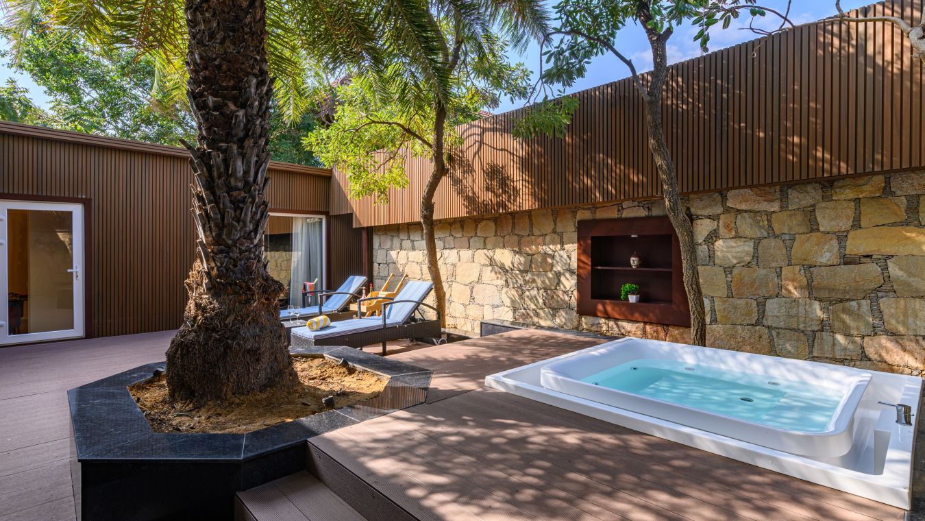 the sit out area of our presidential suite with a jacuzzi for a delightful stay in Pushkar7