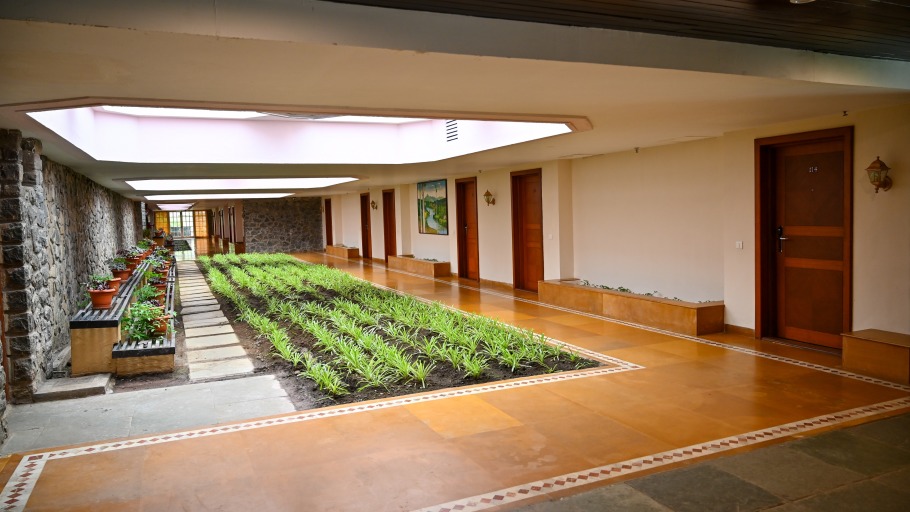 manicured lawn area inside The Carlton hotel in Kodaikanal 2