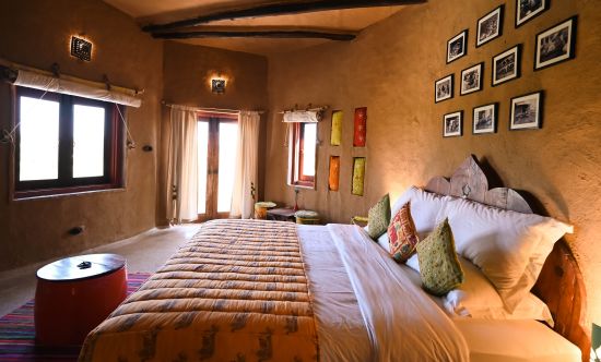 alt-text The bedding and interiors of our cottages - Brij Lakshman Sagar Raipur