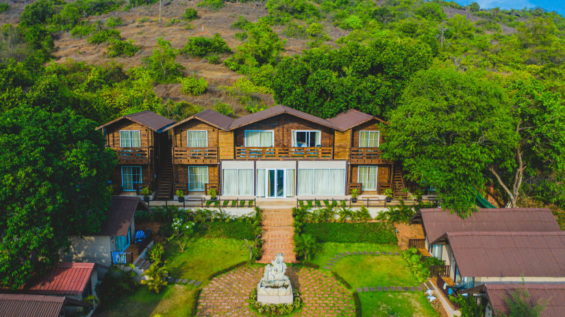 A panorama of our resort in Mandrem against a hilly backdrop 