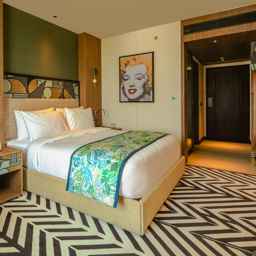 Double bed in one of our Hollywood-themed rooms in Udaipur - Parallel Hotel, Udaipur