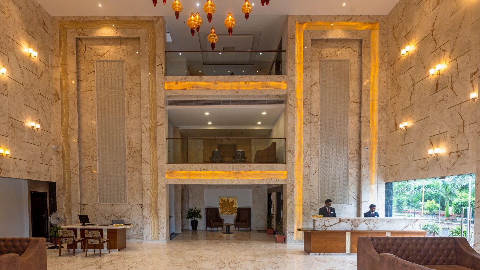 the well-lit Lobby of Pride hotel Bhopal