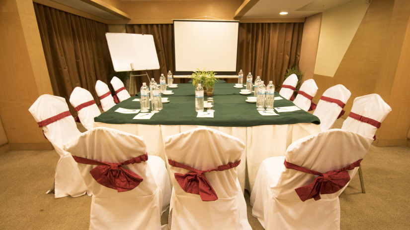 A rectangle seating arrangement inside the Emrald Board Room Hotel VITS Aurangabad