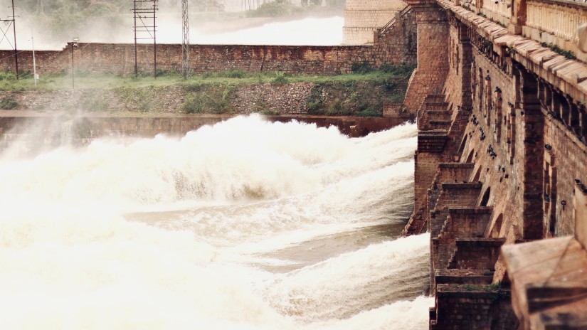 side angle view of a dam on a river captured during daytime