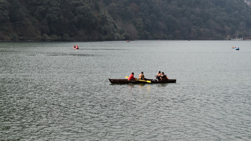 people boating across a river