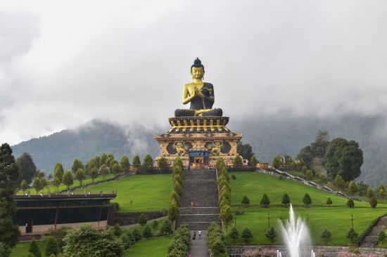 alt-text an image of the popular Buddha Park in Sikkim with the statue of Lord Buddha meditating amidst a green park