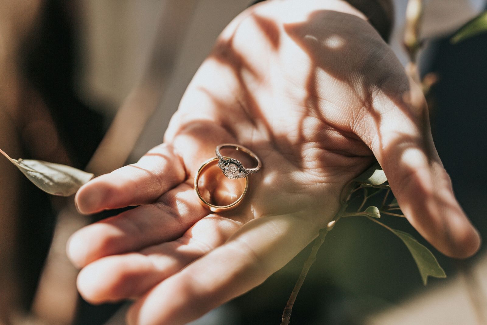 a person holding a ring in their palm