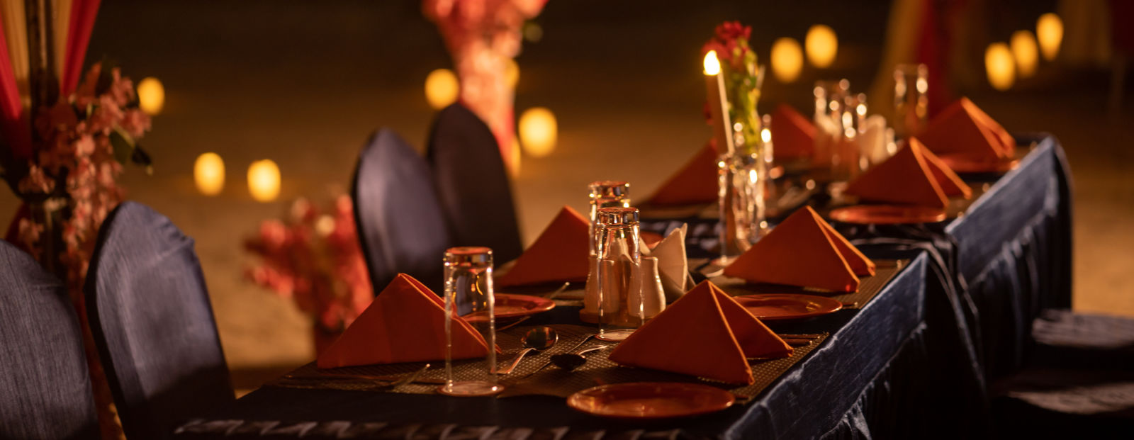 Candlelight dinner by the beach at Coral Reef Hotel & Resort