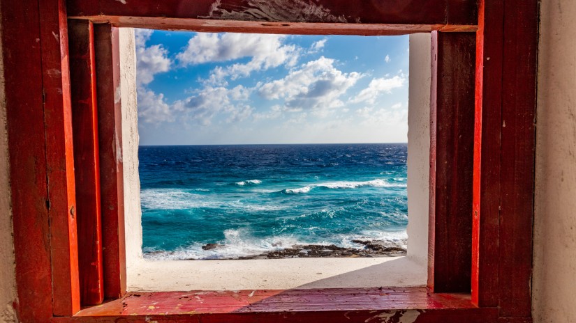 A window that opens to the beach - sea-facing hotel in Mumbai