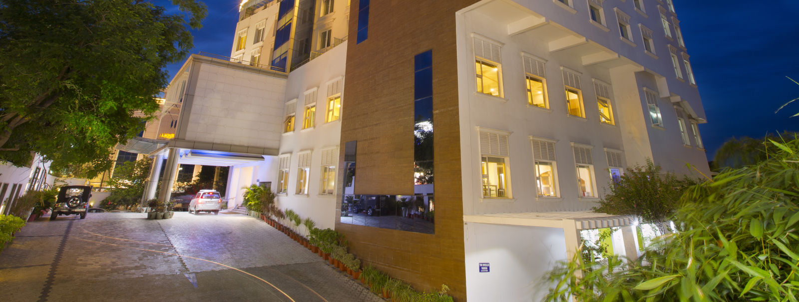 facade of Hotel Atithi - TGI Grand, Pondicherry at night