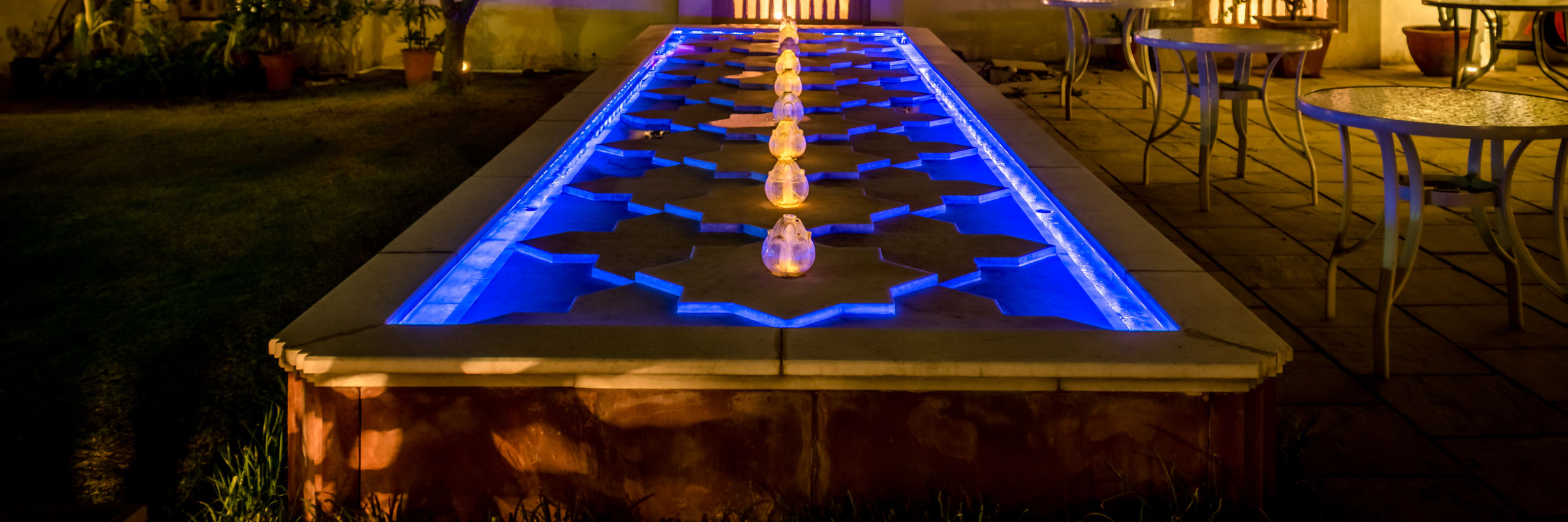 A fountain with LED lights on the side - Mandawa Haveli, Jaipur