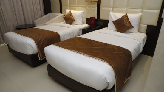 Udman By Ferns N Petals Chattarpur - deluxe room with premium bed and room amenities1