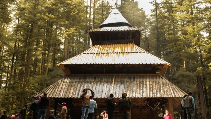 People standing outside a temple