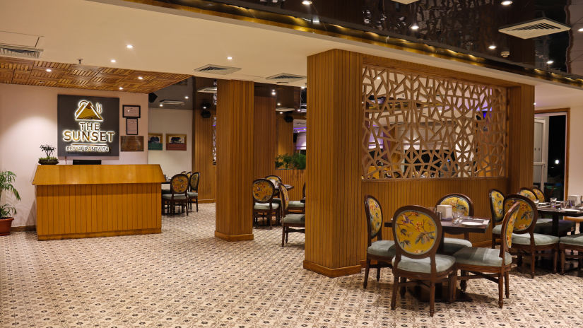 interior and seating arrangements inside The Sunset bar & Restaurant at Rosetum Kasauli