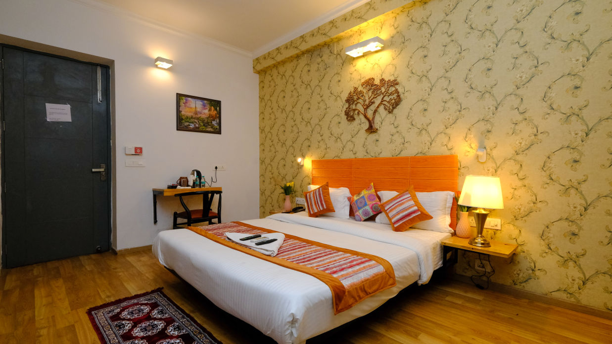 Interior of Deluxe Room at Lime Tree Hotel and Party Hall Sector 39, Gurgaon 4