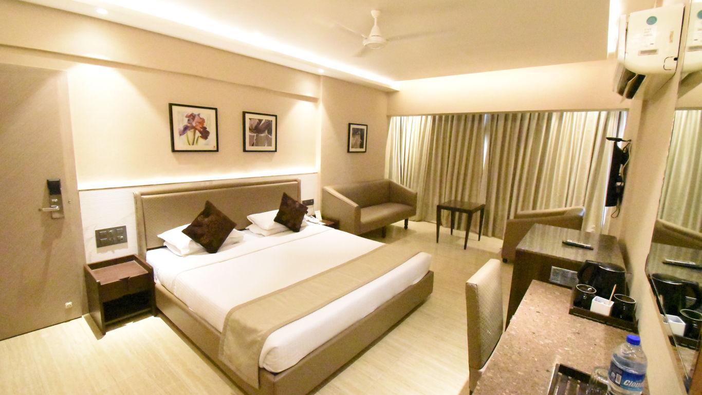 a double bed in one of our rooms near Mumbai Airport