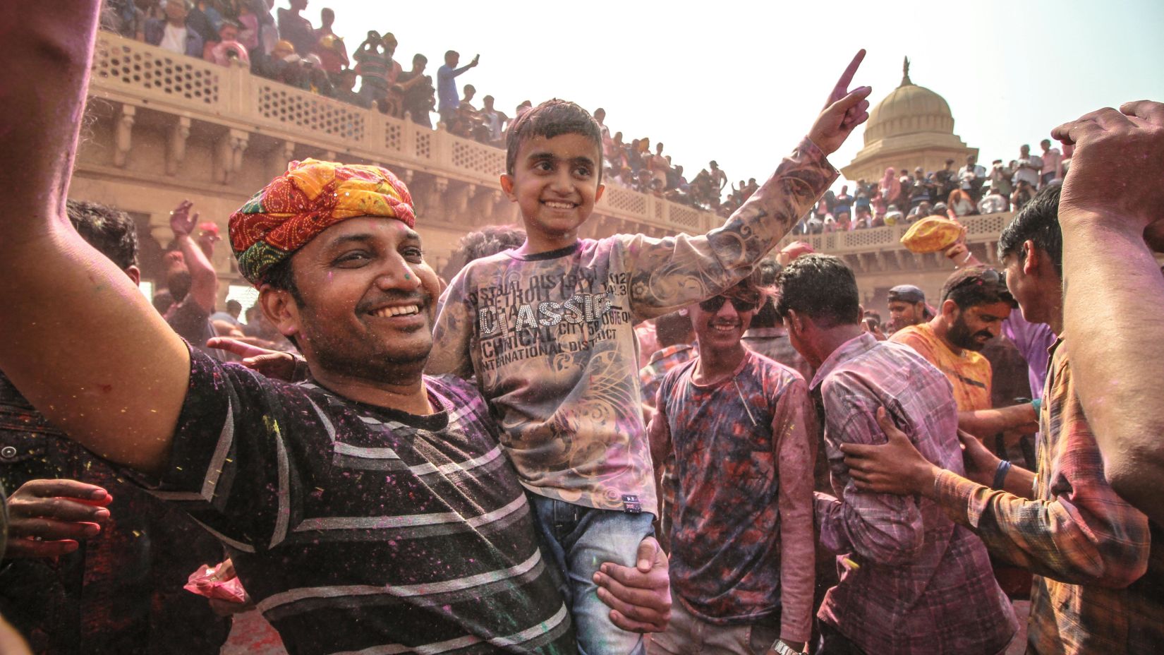 People with their children's are celebrating Holi in Udaipur - Udaipur