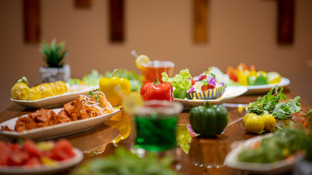 green yellow and red food items on a table