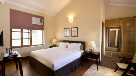 Deluxe Room features soft bedding and pleasant hues 3 - Lamrin Boutique Cottages Rishikesh