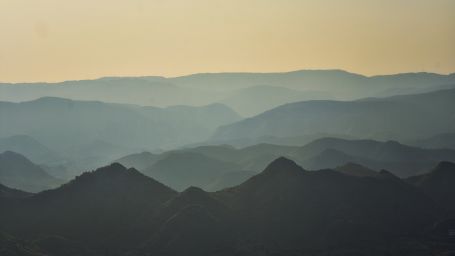 Image of layers of mountains on a gloomy day