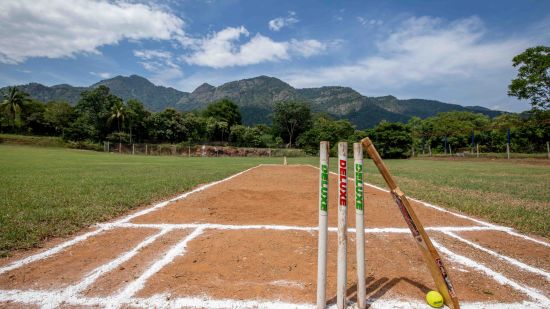 a cricket pitch with wickets, cricket bat and a tennis ball - Black Thunder, Coimbatore