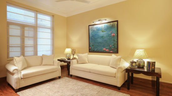 lounge features white sofas in an airy room - Lamrin Boutique Cottages Rishikesh