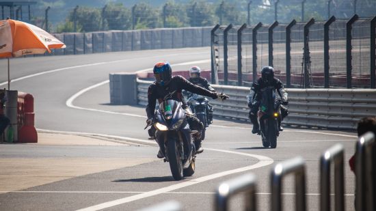 two guys riding motorbikes