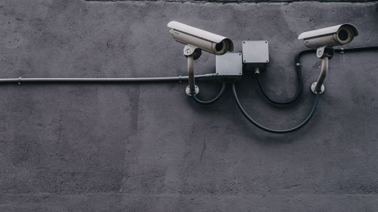 Surveillance cameras on a wall