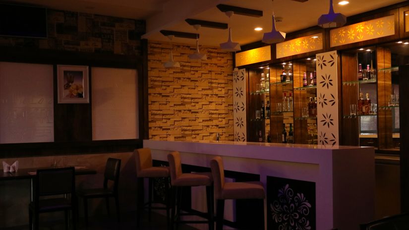 Side view of bar with modern interior - Click Hotel - Sagar Plaza , Chakan Pune