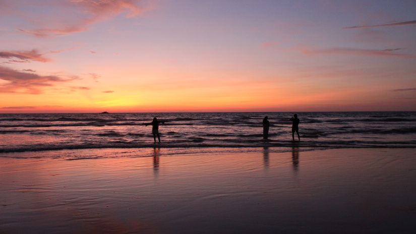 people standing on the gokarna beach