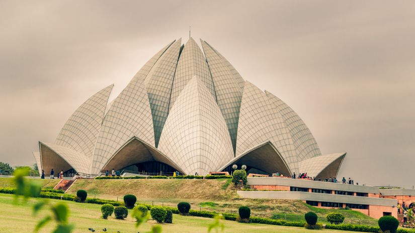 a beautiful view of the famous lotus temple in delhi