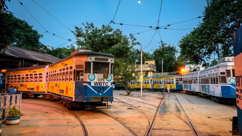 a tram driving through the rails 