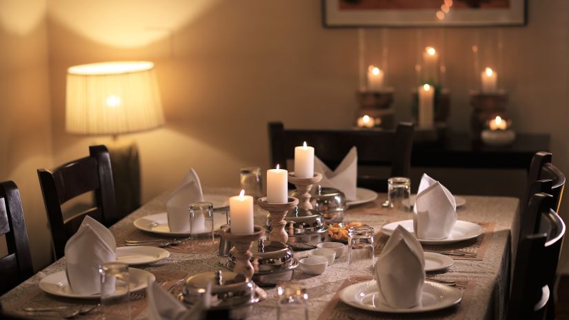 Dinning table set with candles @ Lamrin Boutique Cottages, Rishikesh