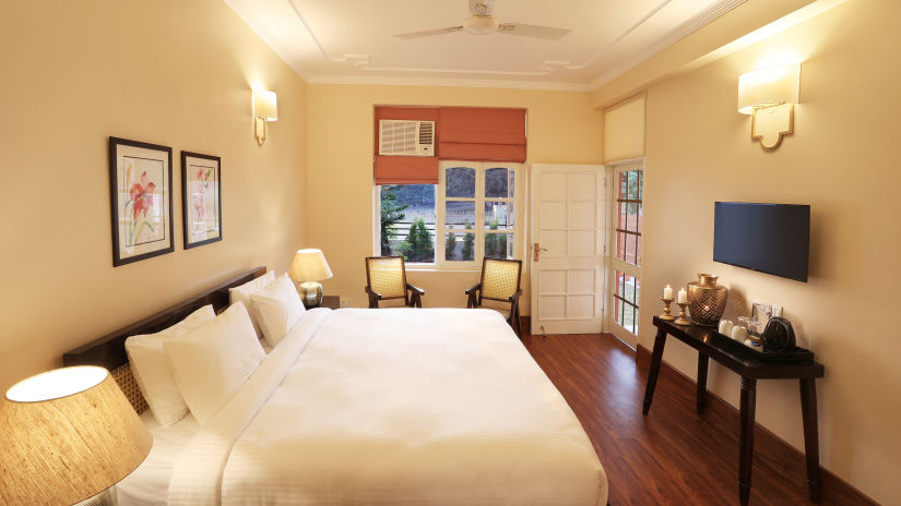 Super Deluxe Room is equipped with soft bedding and modern furniture 3 - Lamrin Boutique Cottages Rishikesh