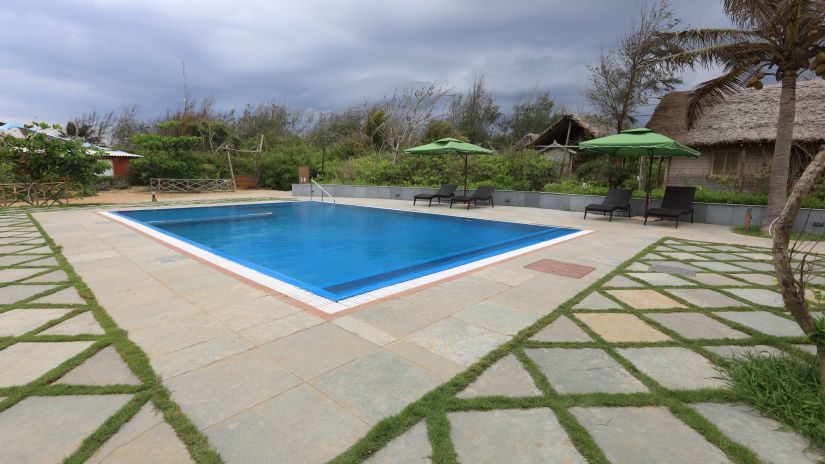 Swimming pool area of Louts Eco beach Resort Konark.