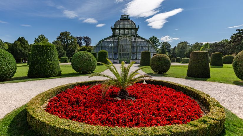 Scenic botanical garden with an elegant structure shot during the day