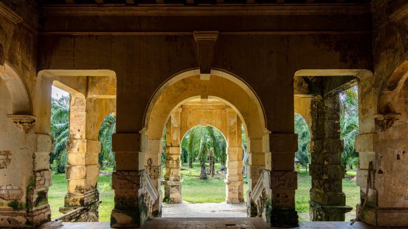 an ancient architecture with worn out stone pillars