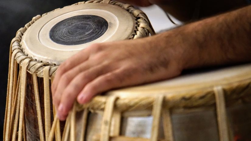 Floatel Kolkata - A person playing the tabla